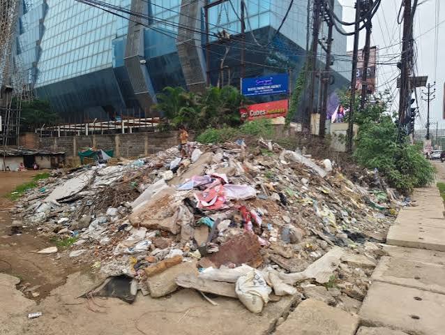 Babylon Tower management , r dumping debris , VIP Road; businessman 